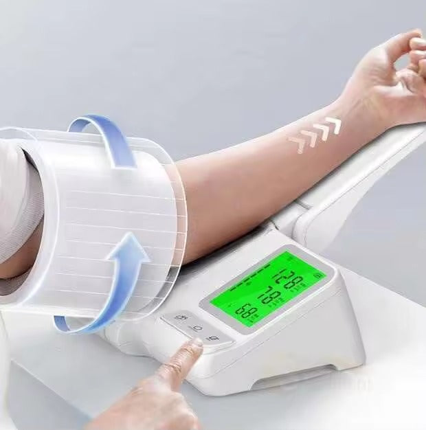Close-up of the Biohale blood pressure monitor's wraparound cuff closing around the upper arm, illuminated display showing blood pressure and pulse